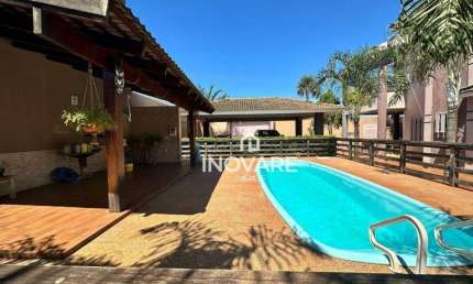 Casa com 4 dormitórios à venda, 206 m² por R$ 1.800.000,00 - Jardim América - Itumbiara/GO