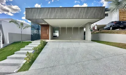 Casa moderna e espaçosa em condomínio fechado – Vespasiano/MG | 402m² de terreno | 185m² construídos | 3 suítes + escritório | Área gourmet completa