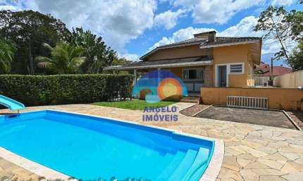 Casa com 4 dormitórios, 180 m² - venda por R$ 1.150.000,00 ou aluguel por R$ 5.000,00/mês - Bougainvillee V - Peruíbe/SP