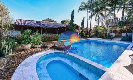 Espetacular sobrado com 5 dormitórios à venda, 640 m² por R$ 2.500.000 - Bougainvillee V - Peruíbe/SP