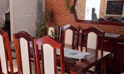 Casa com 3 quartos à venda na Rua Rezende, Centro, Uberlândia