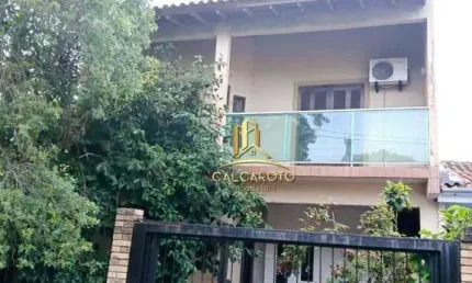 Sobrado com 3 dormitórios à venda, 150 m² por R$ 370.000,00 - Jardim Algarve - Alvorada/RS