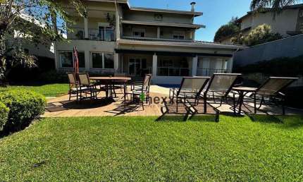 Casa com 4 dormitórios à venda, 472 m² por R$ 3.200.000,00 - Condomínio Portal do Lago - Valinhos/SP
