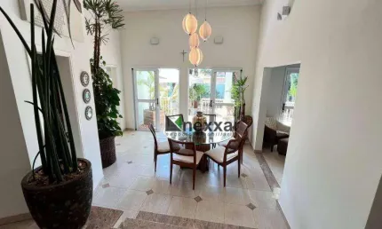 Casa com 3 dormitórios à venda, 307 m² por R$ 1.650.000,00 - Condomínio Residencial Terras do Caribe - Valinhos/SP