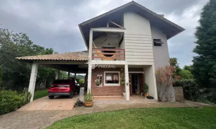 Casa com 3 quartos à venda na Professor Romildo Bolzan, 2304, Morro da Borússia, Osório, 220 m2 por R$ 1.800.000