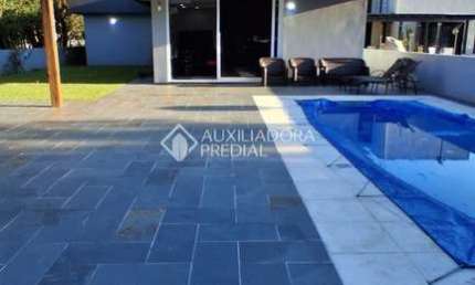 Casa em condomínio fechado com 4 quartos à venda na Linha Pontal, 4700, Palmital, Osório, 185 m2 por R$ 1.200.000