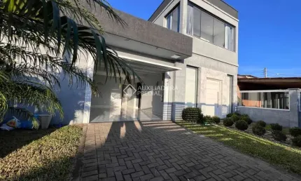 Casa com 3 quartos à venda na 40, 1543, Santa Luzia, Capão da Canoa, 180 m2 por R$ 615.000