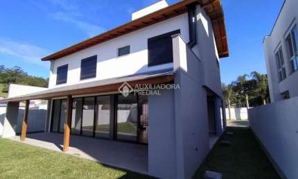 Casa em condomínio fechado com 4 quartos à venda na Rua Leonel Pereira, 2090, Cachoeira do Bom Jesus, Florianópolis, 230 m2 por R$ 1.980.000