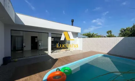 Casa pronta para morar com 3 quartos, piscina e espaço gourmet! no bairro Nova Divinéia - Araranguá/SC