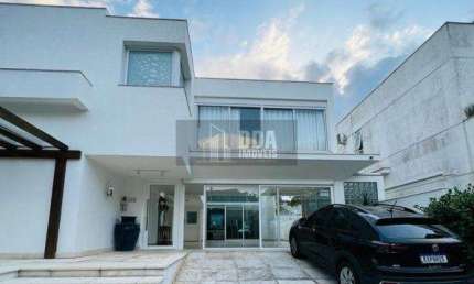 Linda casa,4 suites,piscina, em Condomínio alto padrão, Jurerê.