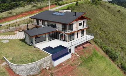 Casa em condomínio fechado com 5 quartos à venda no Descansopolis, Campos do Jordão  por R$ 5.350.000