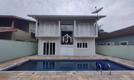 Casa em condomínio fechado com 4 quartos à venda em Horto Florestal, Ubatuba  por R$ 980.000