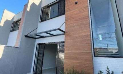 Sobrado com 3 dormitórios à venda, 113 m² por R$ 690.000,00 - Centro - Balneário
