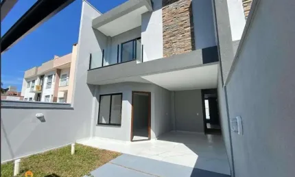 Sobrado com 3 dormitórios à venda, 116 m² por R$ 929.200,00 - Itacolomi - Balneá