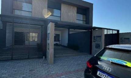 Sobrado com 3 dormitórios à venda, 119 m² por R$ 579.000,00 - Itacolomi - Balneá