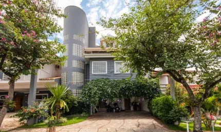 CASA EM CONDOMINIO,5 Dormitorio(s) bairro Villa Dos Inglezes VILLA DOS INGLEZES