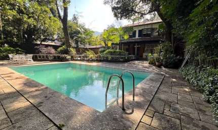 Linda casa à venda no condomínio Jardim do Itanhangá Barra da Tijuca de 564 m² em terreno de 1200m² com 4 quartos sendo 2 suítes 1 Master 4 Vagas