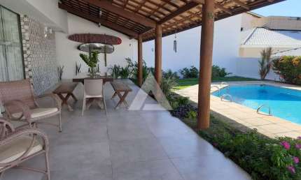 Casa em Vilas do Atlântico com 4 suítes, 317m² à venda por R$ 1.750.000,00