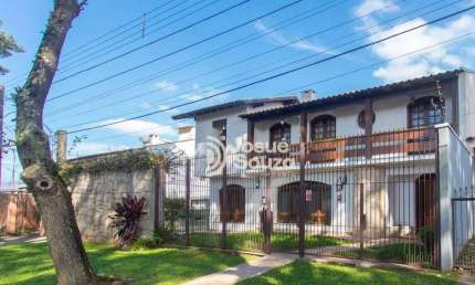 Casa com 3 quartos à venda na Rua Câmara Júnior, 12, Jardim das Américas, Curitiba