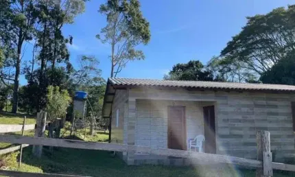 [118777] CHÁCARA EM NOVA HARTZ COM TRÊS CASAS, AÇUDE, POMAR, ROÇA, HORTA E FIBRA ÓTICA