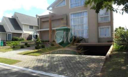 Excelente casa para venda ou locação Alphaville Pinhais, com 4 suites, 4 salas, 7 bh, moveis planejados todos ambientes, 4 garagens cobert, com 605 m²