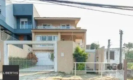 Casa com 3 quartos para alugar na Rua Joaquim Cruz, 521, Santo Antônio, Porto Alegre