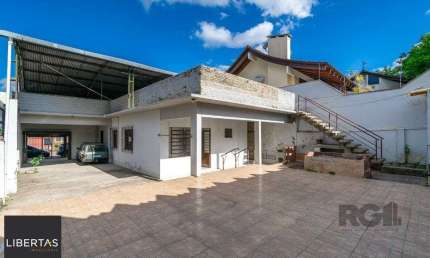Casa com 2 quartos à venda na Rua Dom Jaime de Barros Câmara, 338, Sarandi, Porto Alegre