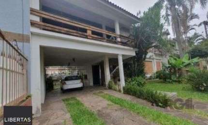 Casa com 3 quartos para alugar na Avenida La Paz, 39, Jardim Lindóia, Porto Alegre