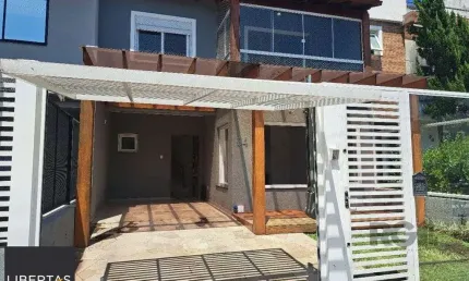 Casa com 3 quartos à venda na Rua Aldo Sani, 84, Hípica, Porto Alegre