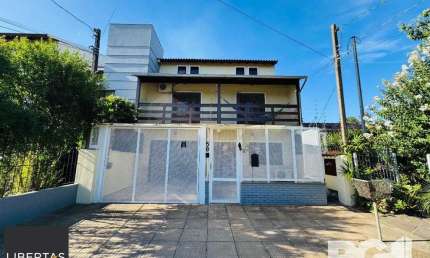 Casa com 4 quartos à venda na Rua Hermínio Bittencourt, 58, Hípica, Porto Alegre