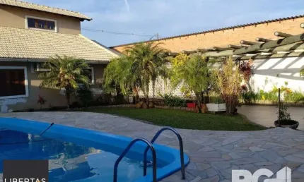 Casa com 3 quartos à venda na Rua Brinco-de-Princesa, 269, Restinga, Porto Alegre