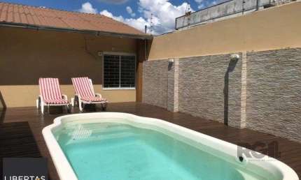 Casa com 3 quartos à venda na Rua Antônio Francisco Lisboa, 70, Rubem Berta, Porto Alegre