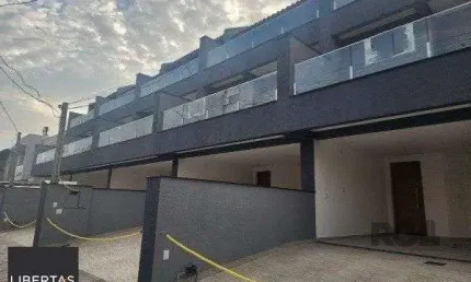 Casa 3 dormitórios com 1 suíte, vaga condomínio Jardins do Prado bairro Hípica Porto Alegre rs