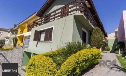 Casa em condomínio fechado com 3 quartos à venda na Avenida Nilo Ruschel, 612, Morro Santana, Porto Alegre