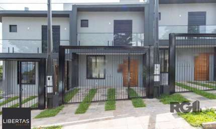 Sobrado novo  no Bairro Tristeza, 3d, 1 suite, churrasqueira, laveira, vista para o Rio.