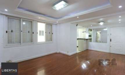 Apartamento semi-mobiliado, possui 3 dormitórios, sendo 1 suíte