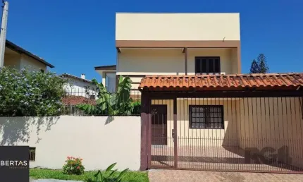 Casa com 2 quartos à venda na Rua Ari Peixoto Martins, 51, Espírito Santo, Porto Alegre