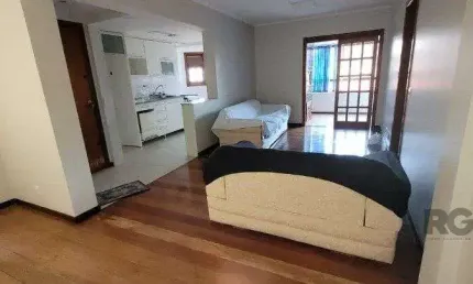 Apartamento de 2 dormitórios grande com suite, sacada fechada com churrasqueira, elevador, garagem, no Bairro São João / Higienópolis