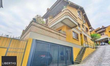 Casa com 3 quartos à venda na Rua Edgar Luiz Schneider, 54, Jardim Isabel, Porto Alegre