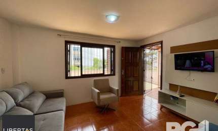 Casa com 4 quartos à venda na Rua Paulino Chaves, 735, Santo Antônio, Porto Alegre
