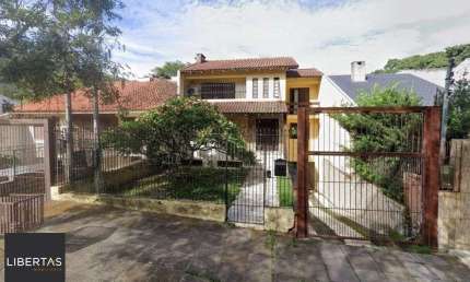 Casa com 4 quartos à venda na Rua Silvério Souto, 487, Teresópolis, Porto Alegre