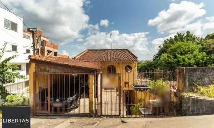 Casa com 4 quartos à venda na Rua Padre João Batista Reus, 2778, Camaquã, Porto Alegre