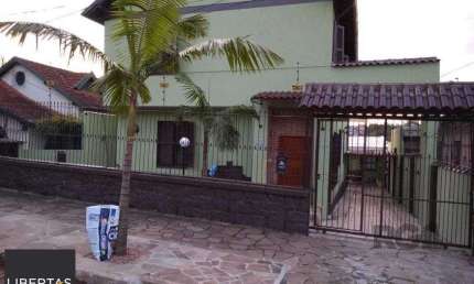 Prédio residencial de 338m² com 4 apartamentos independentes no bairro Santa Tereza
