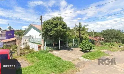 Casa com 3 quartos à venda na Rua Ênio de Souza, 226, Vila Nova, Porto Alegre