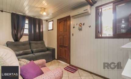 Casa com 4 quartos à venda na Avenida Ipê, 653, Vila Jardim, Porto Alegre
