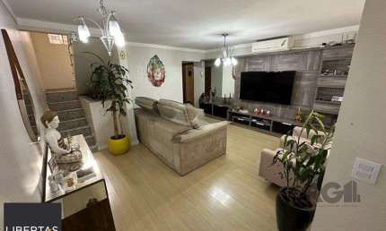 Casa com 4 quartos à venda na Rua Sérgio Porto, 308, Farrapos, Porto Alegre