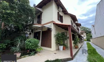 Casa em condomínio fechado com 2 quartos à venda na Rua Coronel João Pinto, 185, Teresópolis, Porto Alegre