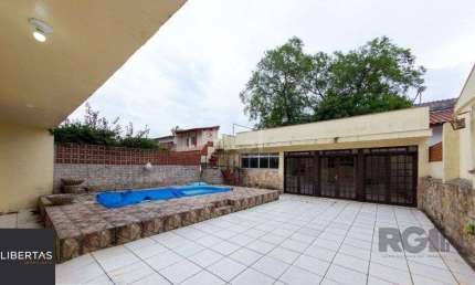 Casa para Venda - 450m², 4 dormitórios, sendo 3 suites, 5 vagas - Nonoai