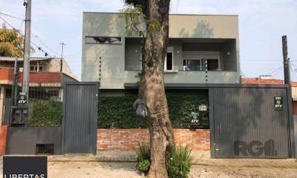 Casa com 4 quartos à venda na Rua Menezes Paredes, 290, Nonoai, Porto Alegre