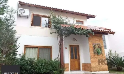 Excelente casa em condomínio com 3 dormitórios e 4 vagas.
